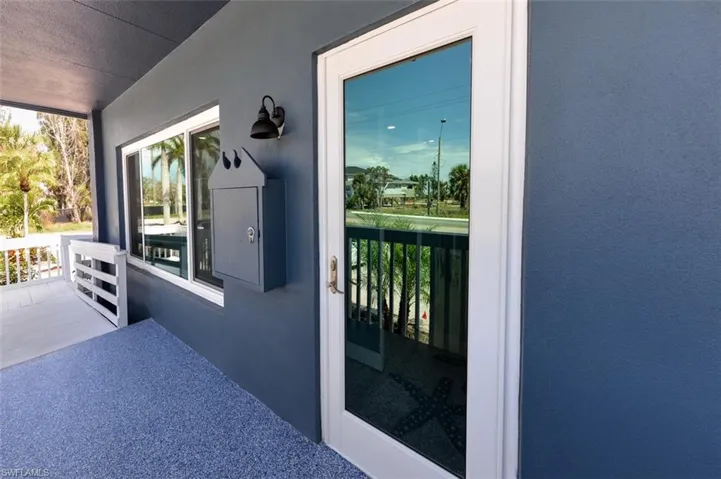Entrance to property featuring a balcony