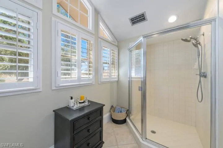 Full bath with separate tub and shower