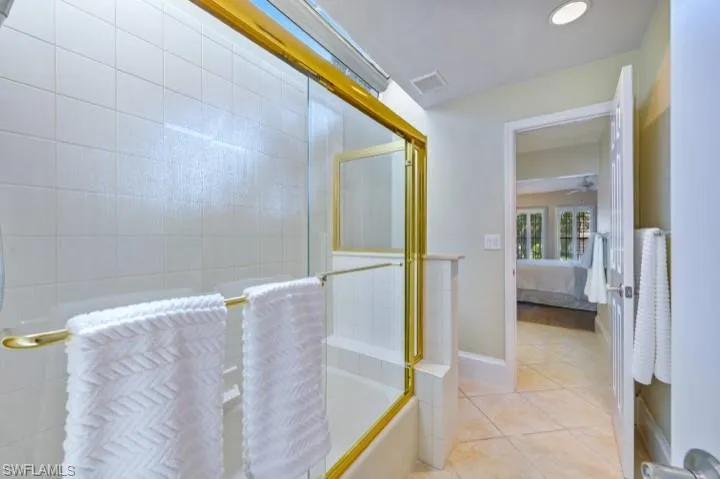 Jack and Jill Bathroom featuring new hurricane impact atrium windows.