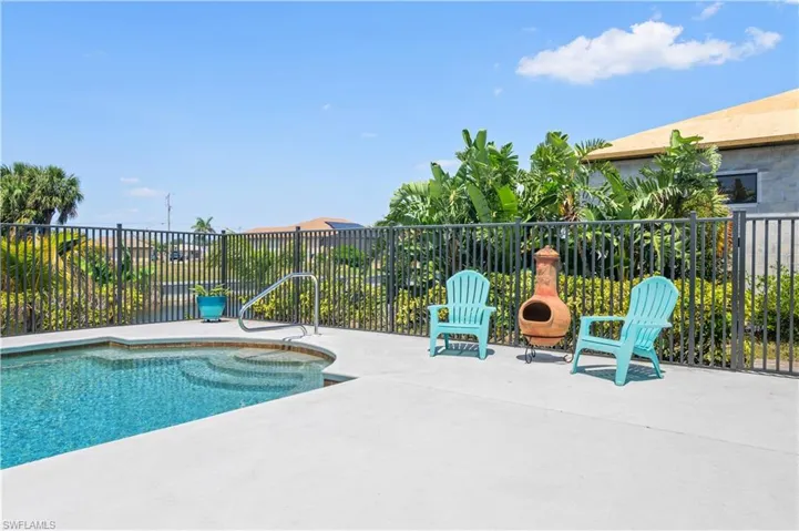 View of pool featuring a fenced in pool, a patio area, and fence