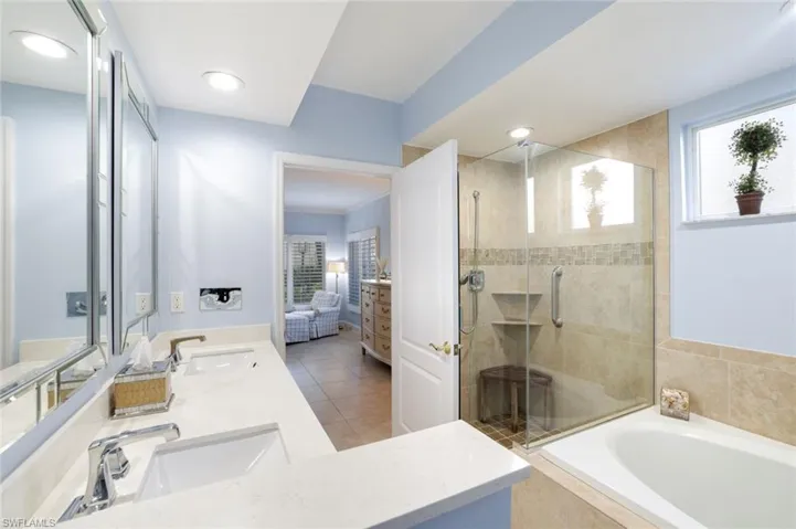 Primary bath with separate shower and tub