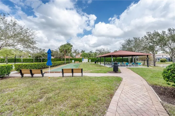 Surrounding community featuring a patio and a yard