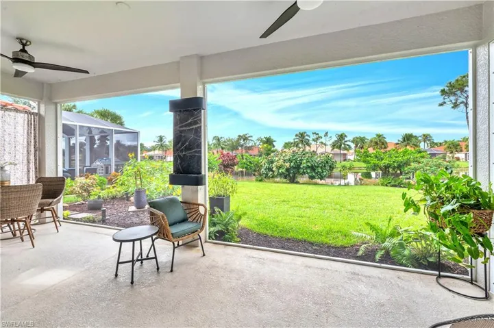 Sunroom / solarium featuring carpet flooring