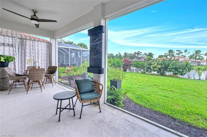 Sunroom featuring ceiling fan