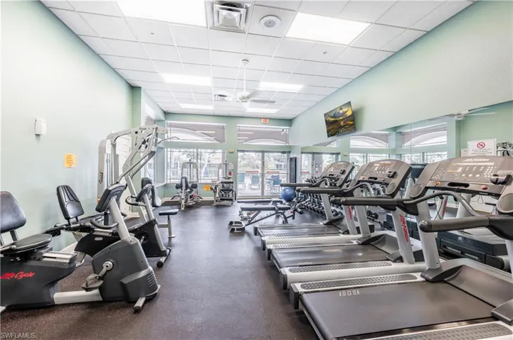 Exercise room with a paneled ceiling