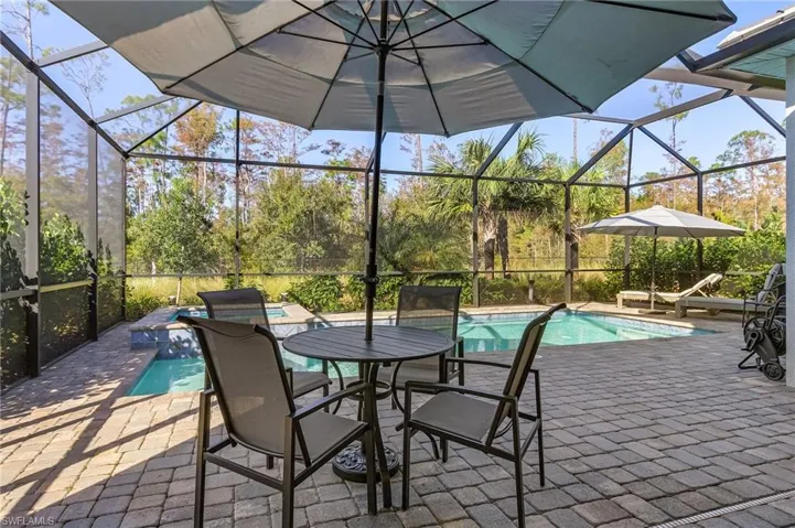 View of patio / terrace with a lanai