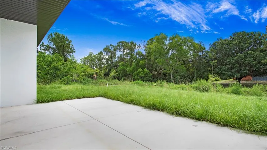 View of patio / terrace featuring a wooded view