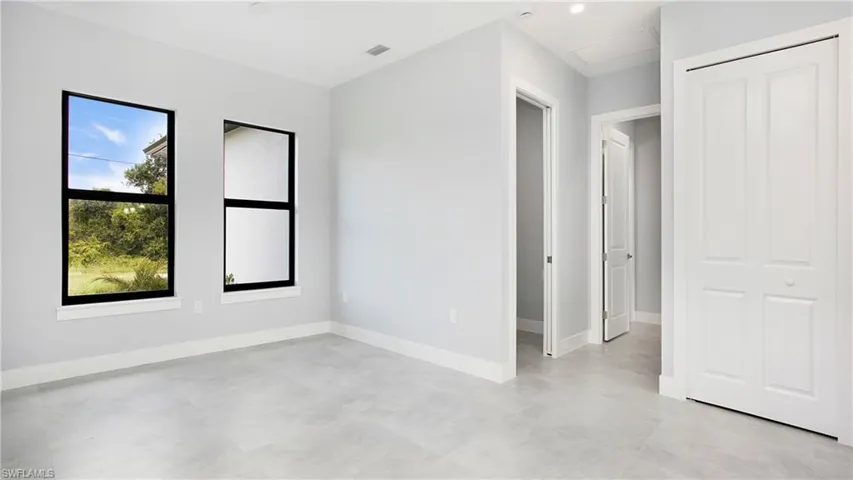 Unfurnished bedroom featuring baseboards