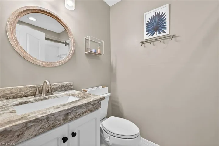 Full bathroom featuring vanity and an enclosed shower