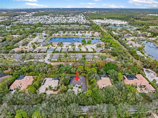 View of property location with nearby suburban area and a large body of water