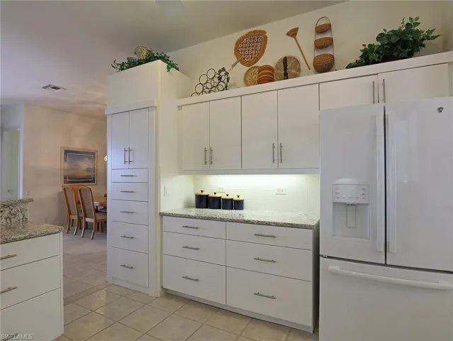 Loads of beautiful white cabinets