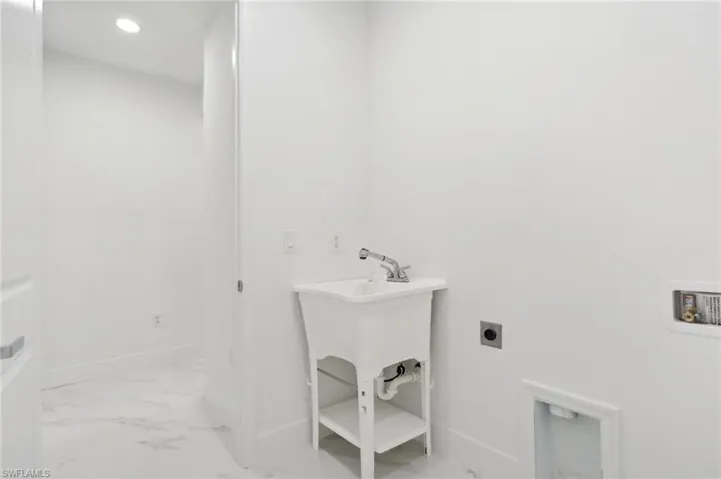 Bathroom featuring tile floors