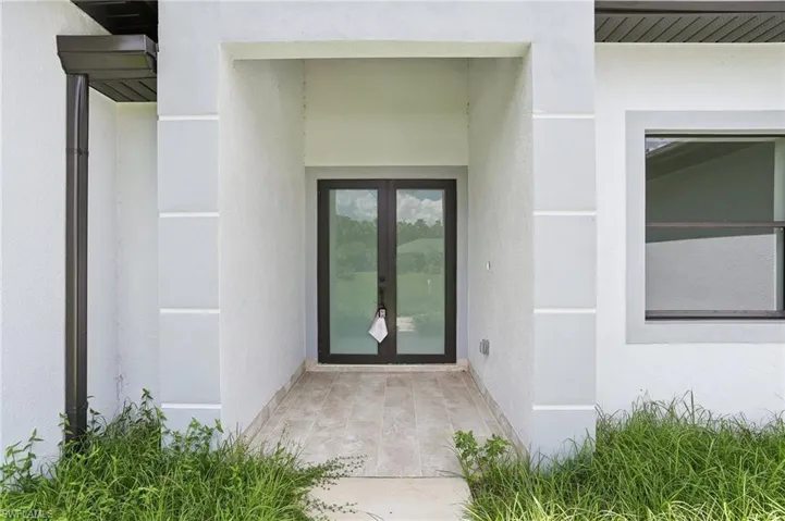 View of exterior entry with french doors