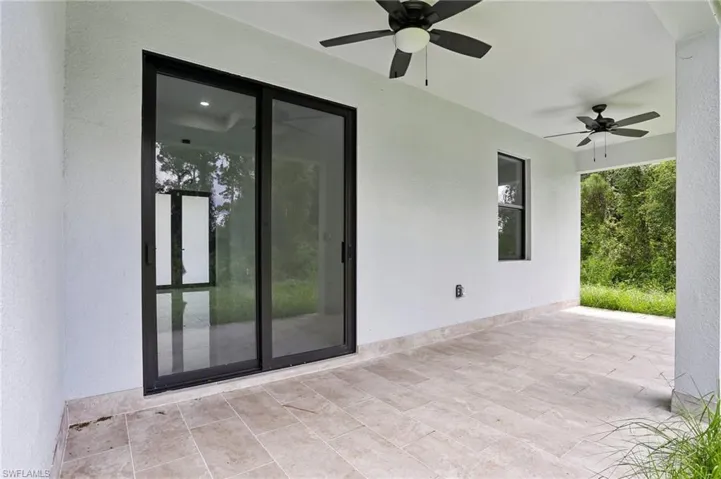 View of patio / terrace featuring ceiling fan
