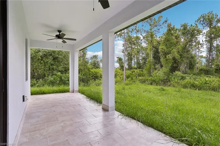 View of terrace featuring ceiling fan