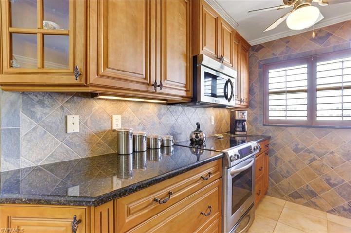 Rich wood cabinetry-extended kitchen!