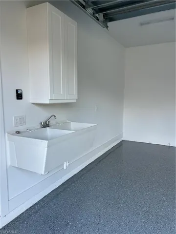Garage featuring sink