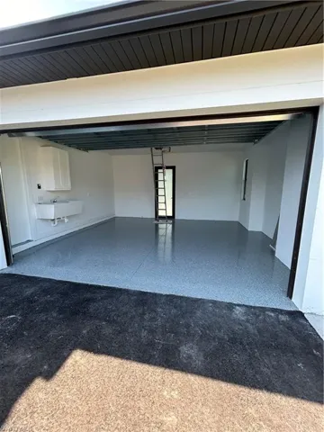 Garage featuring sink