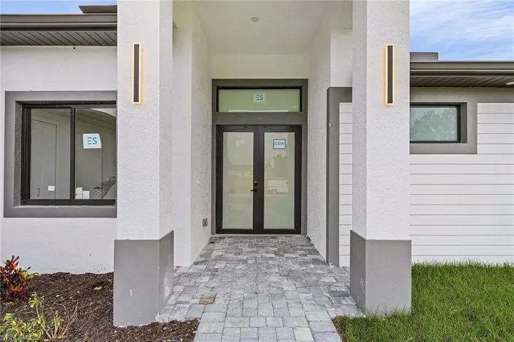 Property entrance with french doors