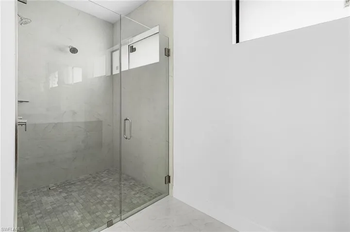 Bathroom featuring walk in shower