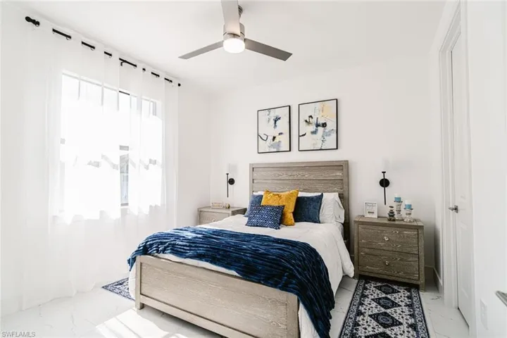 Bedroom featuring ceiling fan