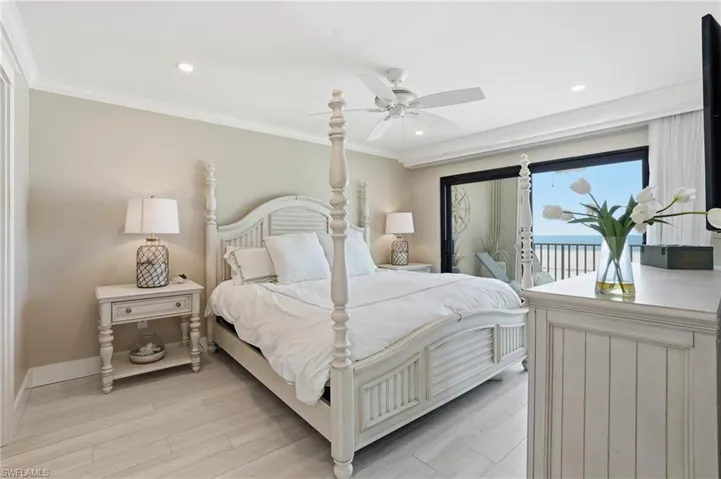Bedroom with crown molding, access to outside, light wood-style flooring, a ceiling fan, and recessed lighting