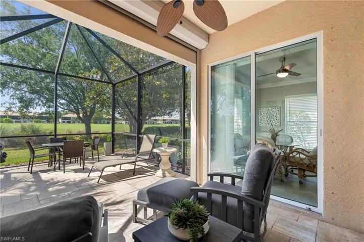 Extended screened patio with golf course view