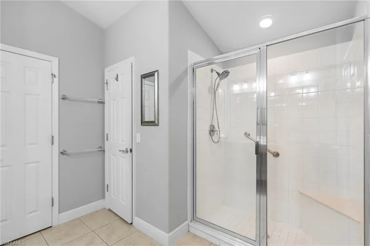 Walk-in shower with glass door