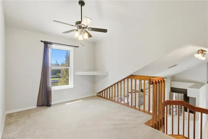 A versatile and airy loft space overlooking the main living area—perfect for a home office, media room, or additional lounge space tailored to your lifestyle.