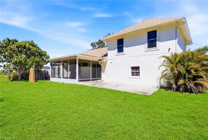 A true Florida paradise with waterfront access, tropical landscaping, and space to relax, play, and enjoy nature.