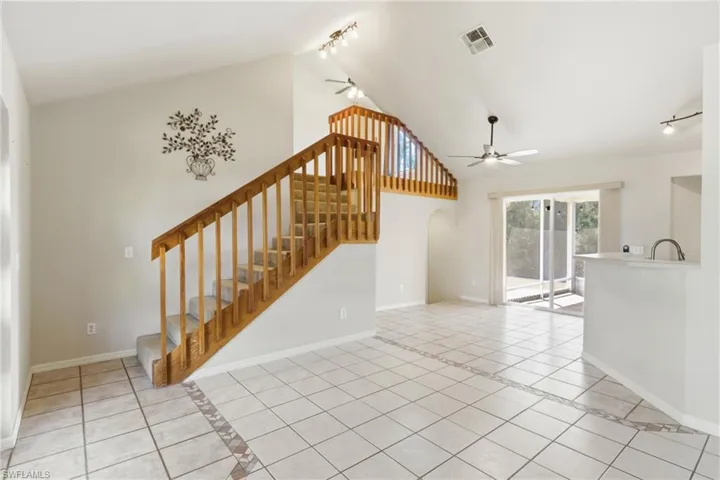 Ascend to your private retreat via a beautifully designed staircase, opening to a versatile loft and serene master bedroom with soaring ceilings and abundant natural light.