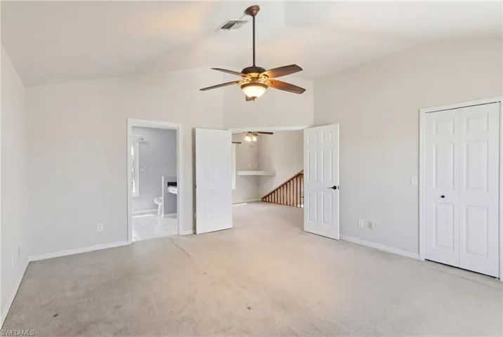Luxurious upstairs primary suite with serene views, open layout, and a peaceful retreat atmosphere.