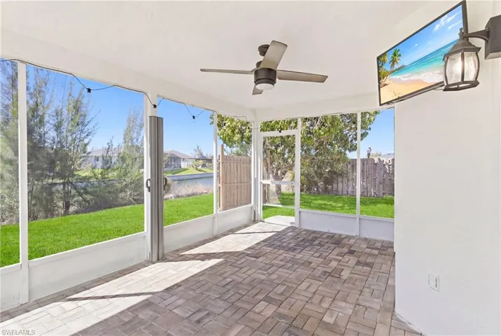Unwind in your screened lanai where breathtaking sunsets paint the sky, overlooking the peaceful freshwater canal—your front-row seat to Florida’s natural beauty.