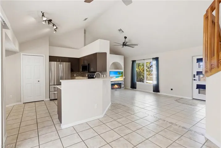 Open-concept kitchen and dining area ideal for entertaining, with modern finishes, abundant storage, and effortless flow into the living spaces.