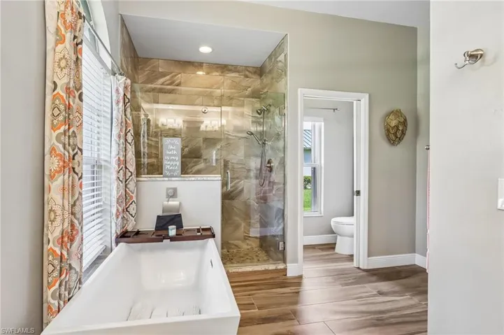 Soaking Tub - Walk-in Shower with Glass Enclosure
