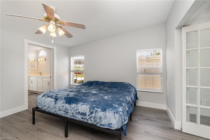 Primary Bedroom with his and her's closets and en-suite