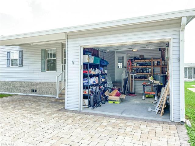 One car enclosed carport with ample storage