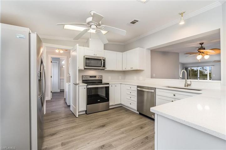 All new flooring throughout, kitchen cabinets, quartz counters and appliances