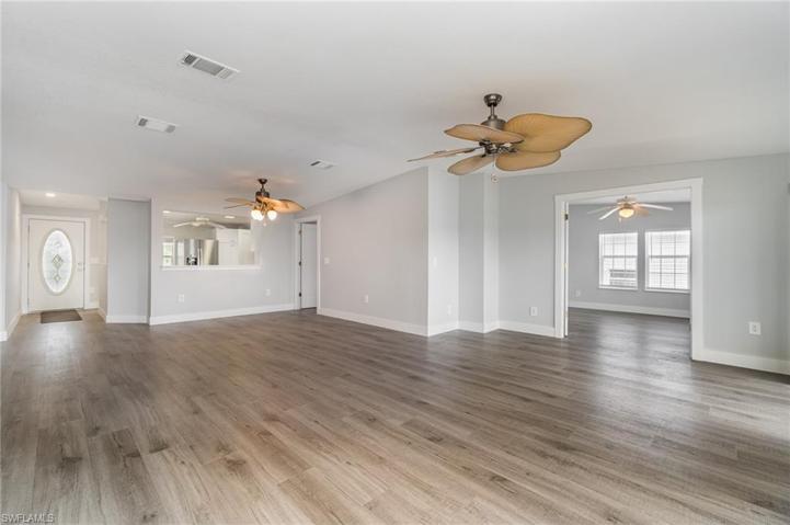 Great open concept. Den/bedroom to the right with french doors
