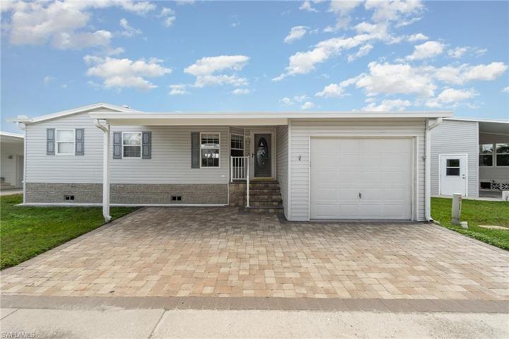 Beautiful pavers and 1-car enclosed carport