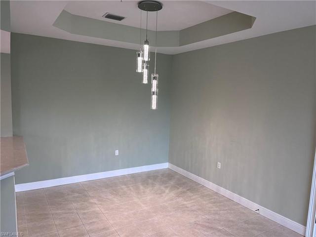 Dining room Plenty of room for large table, hutch and has magnificeint chandelier.