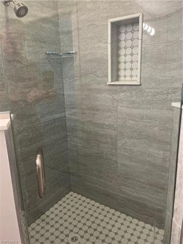Tilework in main bath is perfect choice