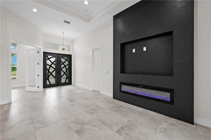 family room with beautiful accent fireplace wall