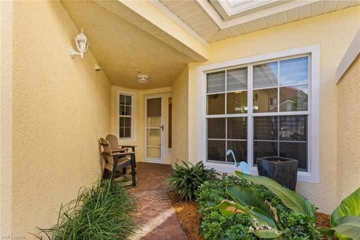 Side entry with well mainted plantings.