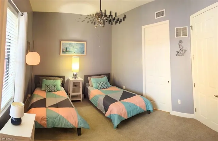 Bedroom featuring carpet flooring