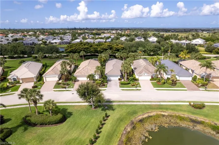 Aerial view of residential area with a large body of water