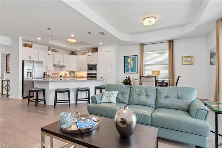 Living room overlooking Kitchen and Dining