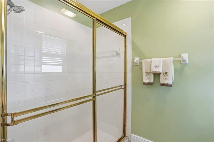 Full bath featuring a stall shower