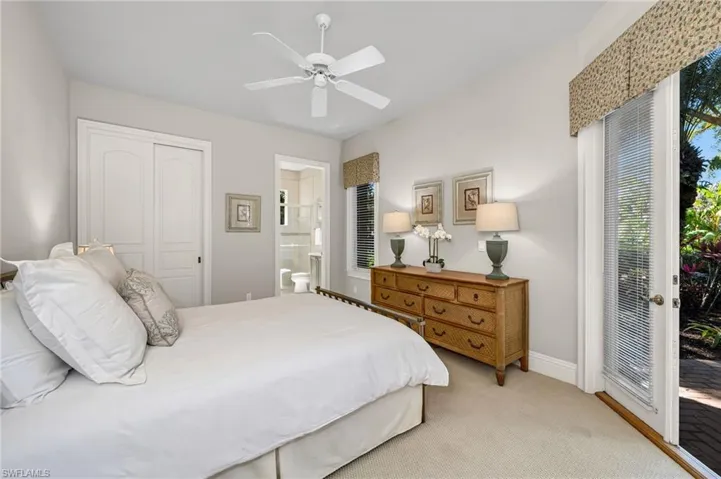 There is guest powder room has Emperador Dark marble top on the vanity, and is right off the kitchen and dining room.