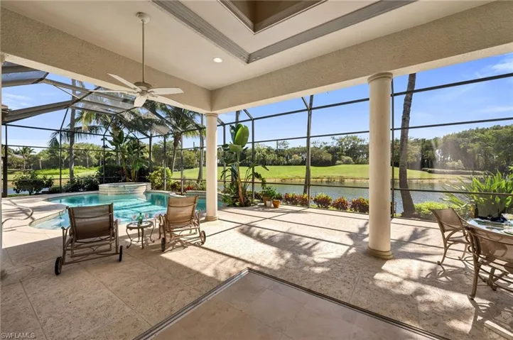 The sliding glass doors in the family room pocket completely, and the expansive lanai and pool beckon.